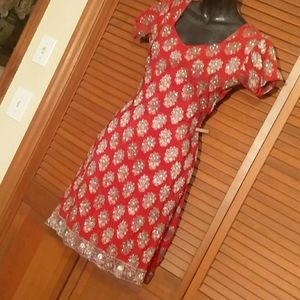 Silver and orange rhinestone covered tunic